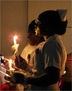 Nurses held candles to light the way for patients' recovery
