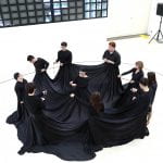 Circle of performers with fabric. In-Out performance, Seoul Museum of Art, Korea
