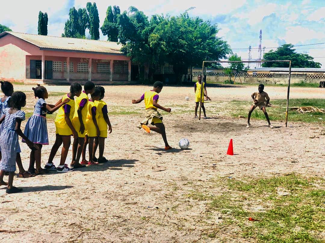 Children playing football in Africa