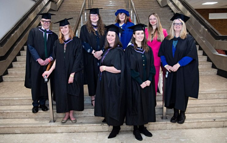 Town planning graduates and lecturers group shot at graduation
