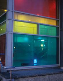 Corner of University of Brighton gallery with coloured gels in windows