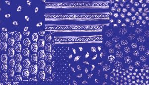 Indigo textile with line and point patterns in white.