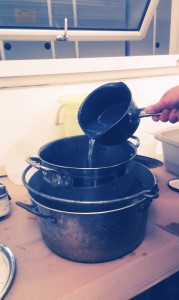 Adding washing soda to the pan