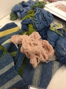Examples of yarns which have been dyed using the woad plant.