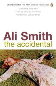 Cover for Ali Smith's novel called The Accidental: shows a young woman with a box camera lying on the grass with eyes closed