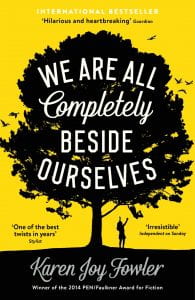 Book cover of Karen Joy Fowler - We Are All Completely Beside Ourselves - a silhouette tree against yellow background