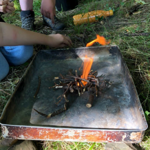 making a fire in a metal tray