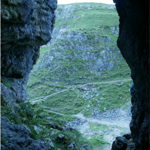 view through crevice behind rocks