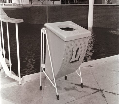 A black and white photographic print showing one of the outdoor litter bins at the Festival of Britain South Bank exhibition site. Designed by Jack Howe. From the Design Council Archive housed at the University of Brighton Design Archives.
