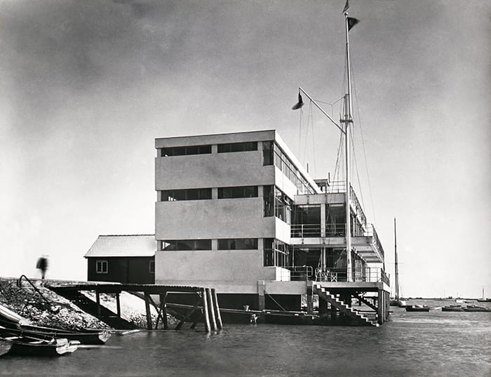 Black and white photo of Royal Corinthian Yacht Club, Burnham , view from sea facing the side of building.