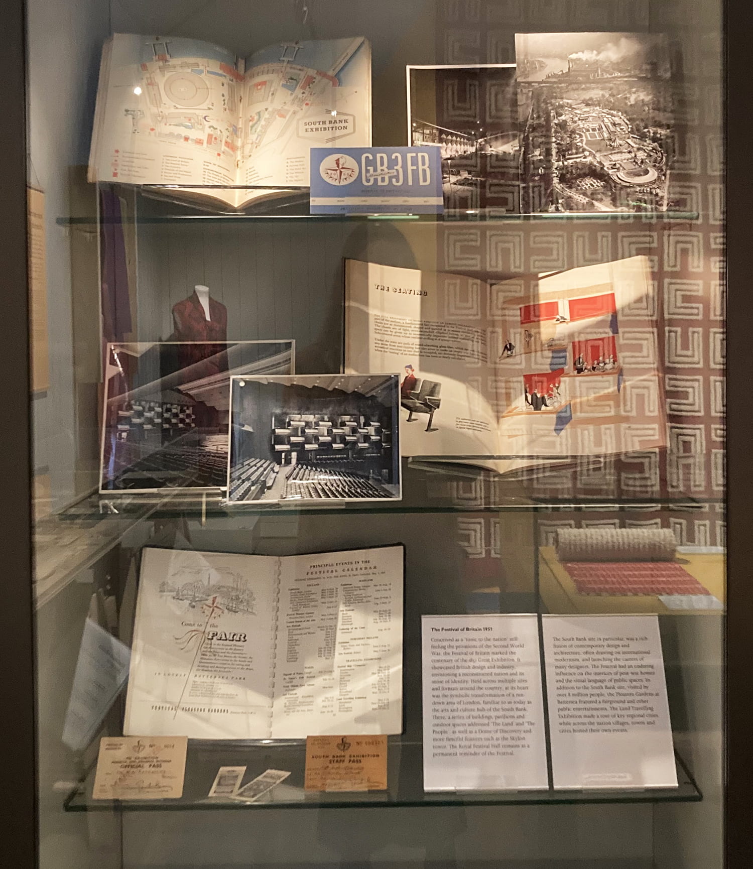 An exhibition display showing archival items relating to the Festival of Britain from the University of Brighton Design Archives