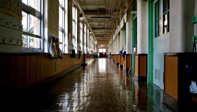 Decorative image of a school building hallway