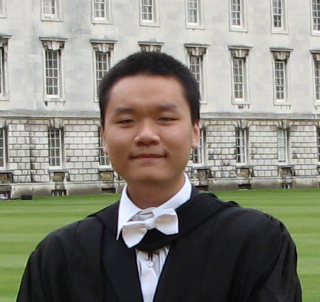 Image of Khuong Nguyen from shoulders up wearing white shirt and tie and black gown