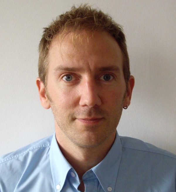 Head shot image of Ryan Southall wearing a light blue shirt and looking straight at the camera