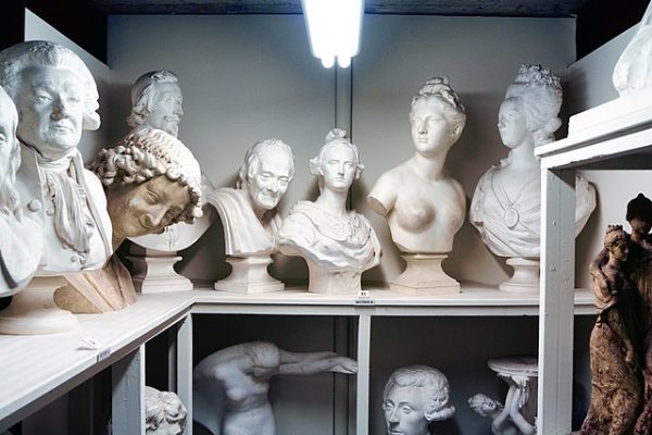 White marble sculptures in museum storage