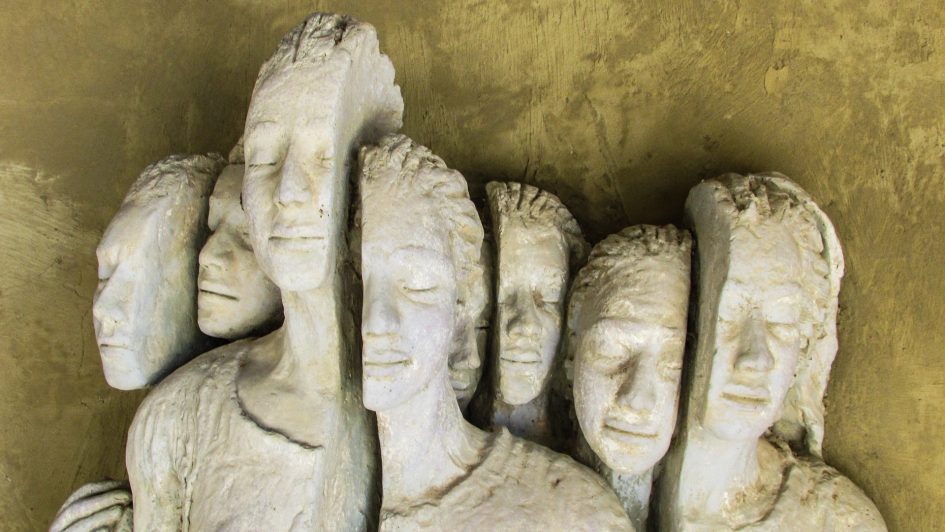 Image of a sculpture depicting fragmented heads of refugees. Found in Cyprus.