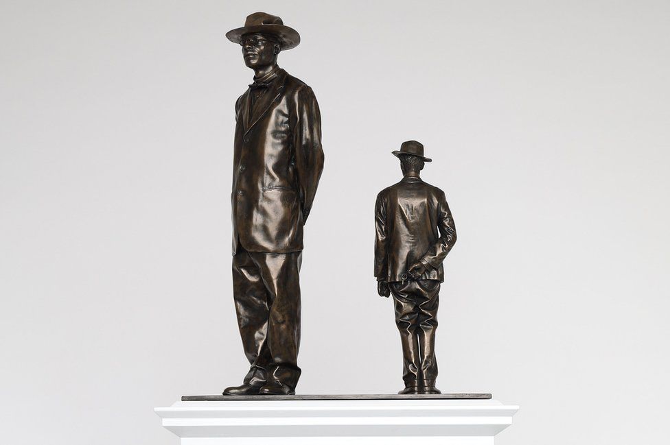 two bronze statue