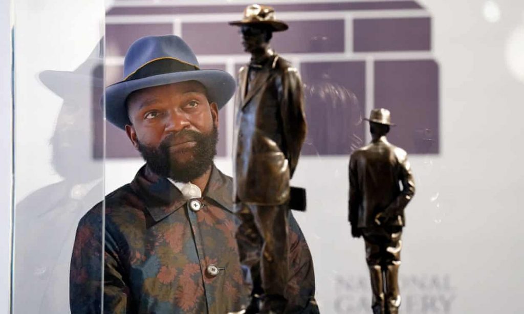 Artist Samson Kambalu with a model of his planned fourth plinth sculpture