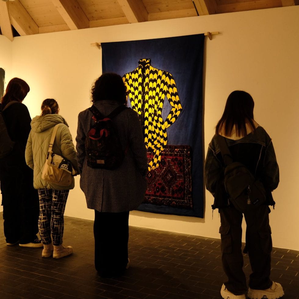 students in an exhibition space