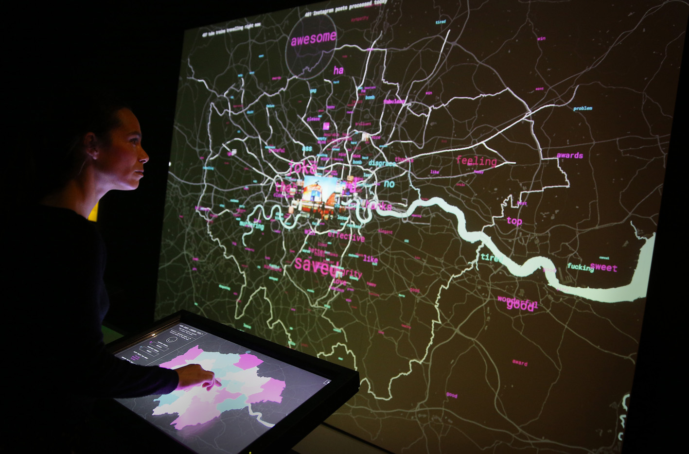 LONDON, ENGLAND - DECEMBER 02: A staff member interacts with a live social media map of London at the Big Bang Data exhibition at Somerset House on December 2, 2015 in London, England. The show highlights the data explosion that's radically transforming our lives. It opens on December 3, 2015 and runs until February 28, 2016 at Somerset House. (Photo by Peter Macdiarmid/Getty Images for Somerset House)