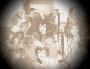 Faded photograph of female abaret dancers