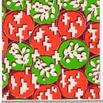 Fabric design large red and green flowers tightly clustered from Walter Fielden Royle collection