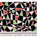 Fabric design geometric shapes in black red and predominant black from Walter Fielden Royle collection