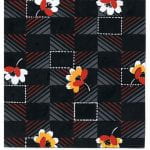 Fabric design of small orange and white flowers with square shapes on dark background from Walter Fielden Royle collection
