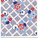 Abstract fabric design with circles and flowers on checked background in blue and white from Walter Fielden Royle collection