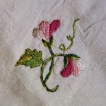 Embroidered vetch or sweet pea flower