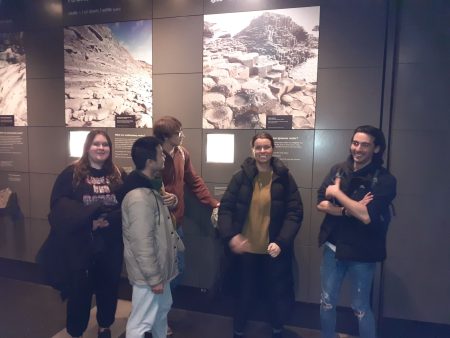 students in front of some of the displays