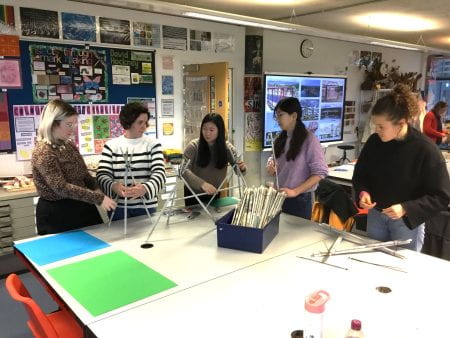 Group of student teachers building a bridge structure with STIX
