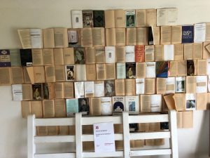 Wall of various editions of Woolf's 'A Room of One's own'