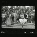 Four images showing people fighting with sacks while standing on log