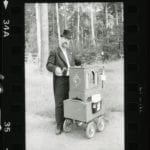 Two images showing an organ grinder in action