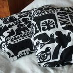 Two cushion covers made with Kanteleen Kutsu (The Call of the Kantele) fabric.