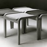 Four cushioned four-legged stools