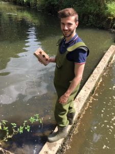 Pieter carrying out river research