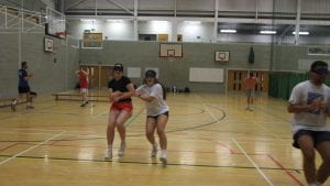 students wearing blind folds in the gym