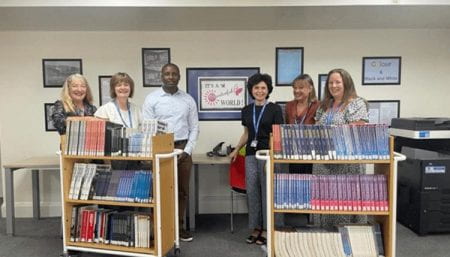 Desmond with library colleagues
