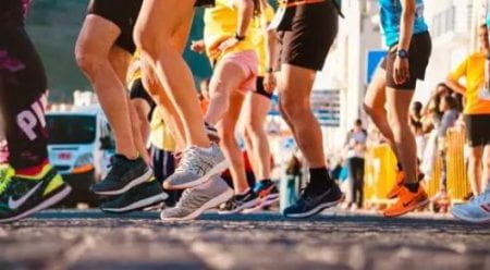legs running during a marathon