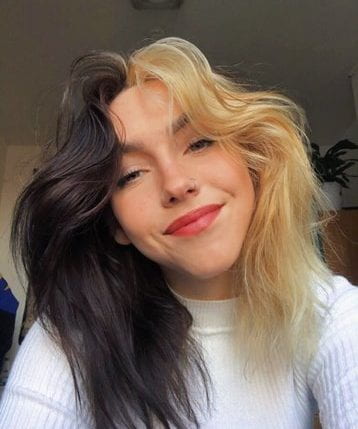 A photo of Charli smiling