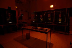 Image of a photographic darkroom in red or safelighting