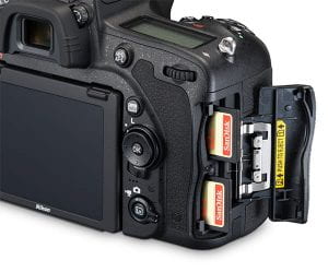 Image showing how to access the SD memory cards on the right side of the Nikon D750 camera