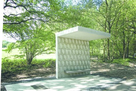 A concrete station sitting amongst wooded area. (Source: Freude Joy Joie Bonn, www 2022)