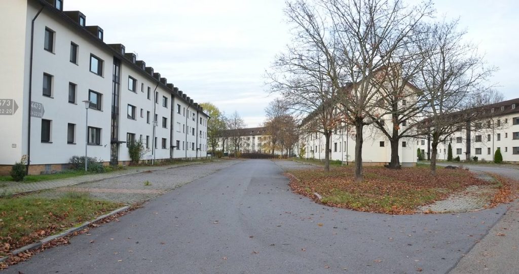 Image of a neighbourhood with 3 storey apartment buildings. (Source: IBA Heidelberg 2021 steht so auf B&V website)