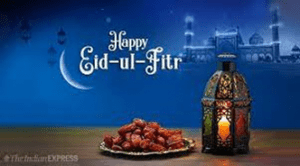A celebratory illustration for Eid showing a plate of food next to a lantern with the night sky and a mosque in the background of the image