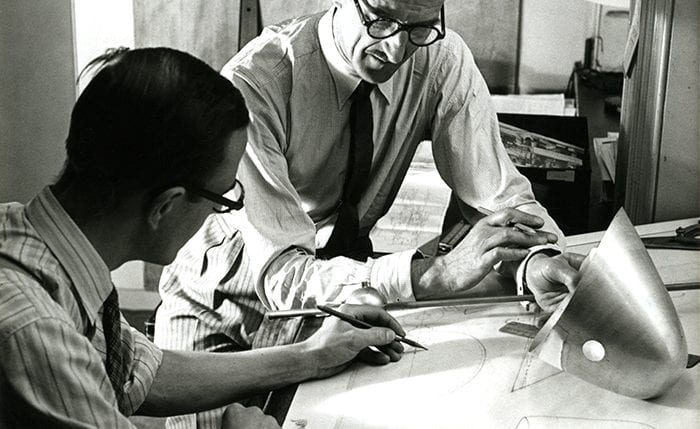 Black and white photo of A.B. Read with a colleague by a drawing table