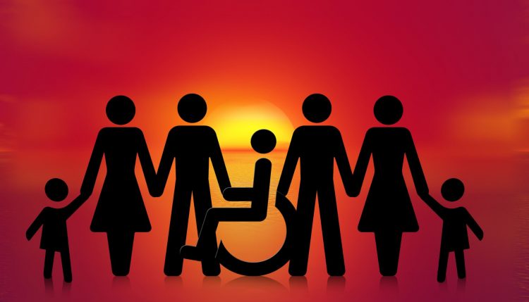 graphic showing silhouette of people - one person in a wheelchair