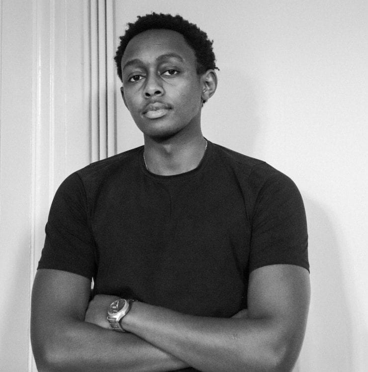 black and white photo of Jesse Mugambi
